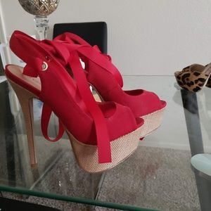 Strappy red heels